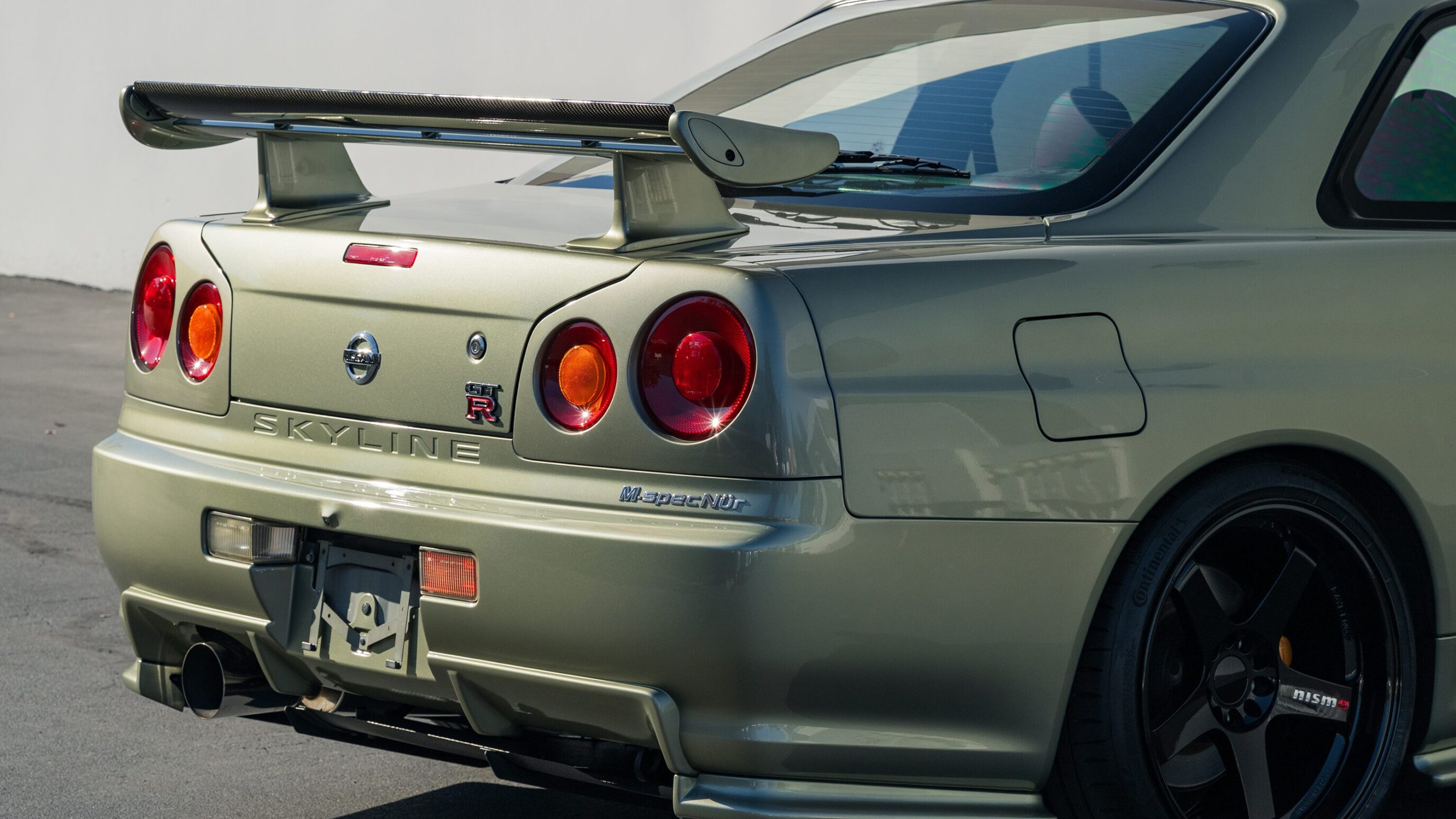 
								1999 Nissan Skyline GTR (BNR34) V-Spec Sonic Silver 2002 Nissan Skyline GTR (BNR34) M-Spec Nür Millennium Jade full									